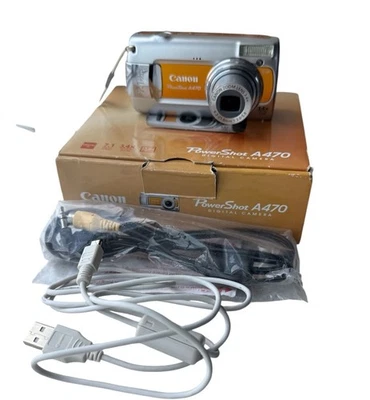 ¡Como nuevo! Cámara digital compacta Canon PowerShot A470 naranja 7,1 MP 3,4x zoom óptico 2,5 Foto 1 de 4