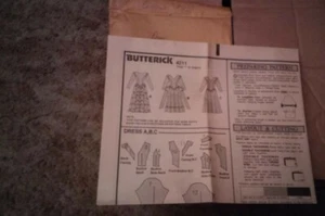 BUTTERICK #4211 DAMEN KLEID MUSTER (Gr: 12-14-16) UNGESCHNITTEN - Bild 1 von 1