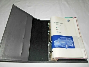 2007 VOLKSWAGEN TOUAREG IN A GRAY VOLKSWAGEN FACTORY CASE- OEM. NICE - Picture 1 of 3