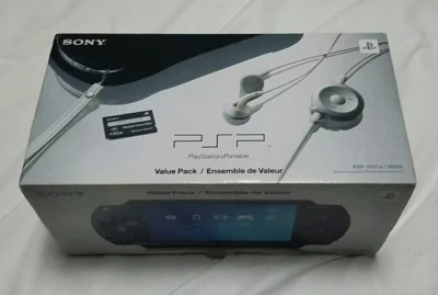 Paquete Sony PSP-1001 (5 películas + 2 juegos múltiples) con accesorios + soporte azul claro PS2. Foto 1 de 4