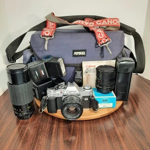 Cámara fotográfica Canon AL-1 35 mm SLR de colección con lentes + flashes + estuche hecha en Japón - Imagen 1 de 22