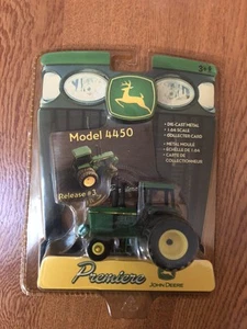 NUEVO TRACTOR ERTL JOHN DEERE SERIE PREMIERE MODELO 4450 CON RUEDAS TRASERAS DOBLES 1:64 - Imagen 1 de 13