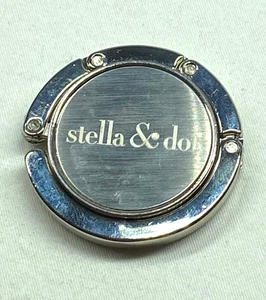 Juego de 3 Colgadores de Bolso Plegable Tres Piezas Cromo Stella y Punto - Imagen 1 de 4