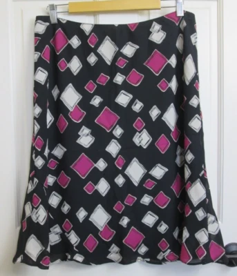 Falda geométrica negra Axcess para mujer talla 16 32x23 forrada transparente 7-31924 Foto 1 de 4