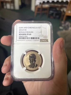 2016 S Ronald Reagan Coin and Chronicles Set $1 Dollar NGC Reverse PF69 - Image 1 of 4