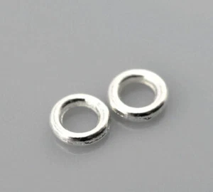 100 anillos de salto cerrados soldados enchapados en plata - calibre 4 mm - 20 (0,8 mm de espesor) - Imagen 1 de 2
