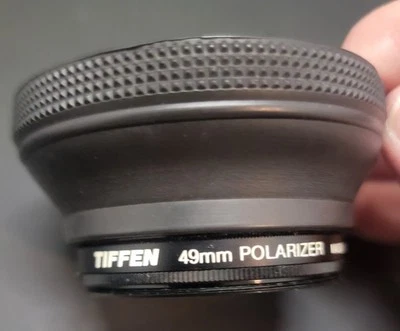 Tiffen 49mm Linear Polarizer And Shade - Helps Eliminate Reflections and Glares - Image 1 of 4