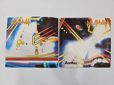 Def Leppard 1087 Lot Of 2 45rpm Records Animal/Pour Some Sugar On Me 1987 - Imagem 1 de 4