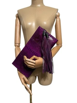 Bolso clutch Gucci de colección púrpura con borla de piel de serpiente Foto 1 de 4