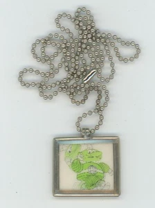 Outer Space Green Alien 1960's VARI-VUE Motion Lenticular Mirror Necklace - Picture 1 of 3