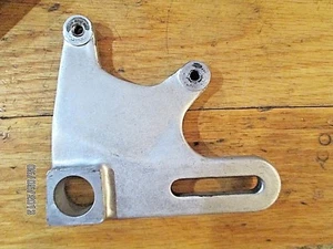 DUCATI OEM SS MONSTER REAR BRAKE CALIPER MOUNT 25MM AXLE - Foto 1 di 7