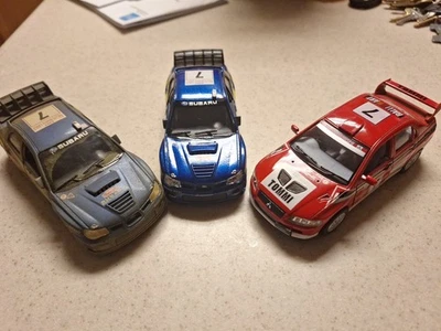 Lote 3 Rojo Mitsubishi Lancer VII SUBARU IMPREZA Evolution VII Kinsmart 1/36  Foto 1 de 4