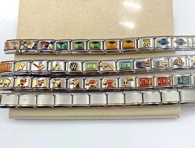 Dolceoro Italy Stainless & Gold Charm Links, 41 Emblems, 18 Blanks New/Old Stock - Image 1 of 4