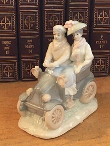 KPM Arnart Imports 1985 Couple Going for a Ride - Picture 1 of 11