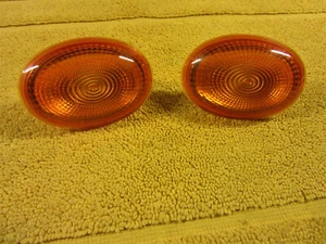 MINI R 56 org. gelbe SEITENBLINKER in guten gebrauchten Zustand - Bild 1 von 3