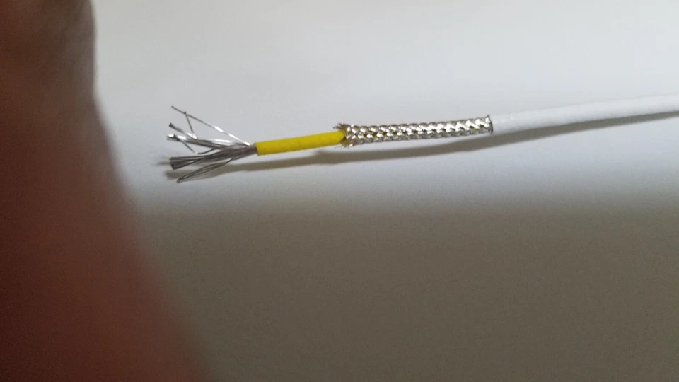 Nuevo alambre de PTFE plateado de 19 hilos blindado Mil-Spec 22-AWG en un solo estado.  Foto 1 de 4