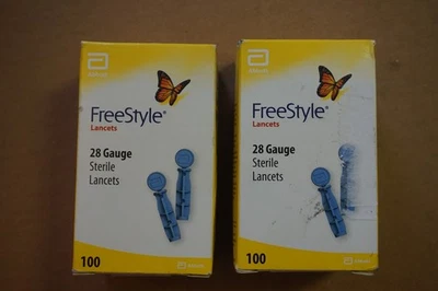 Lancetas de acero inoxidable estériles Freestyle calibre 28 100 unidades cada lote de 2 Foto 1 de 4