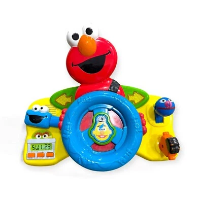 Brinquedo volante de motorista vintage Sesame Street Elmo Giggle 'n Go 2006 - LEIA - Imagem 1 de 3