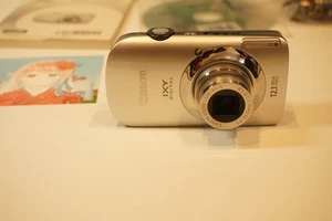 Canon IXY DIGITAL 510 IS / PowerShot SD960 IS – 12.1MP Silver Camera – Near Mint - Picture 1 of 22