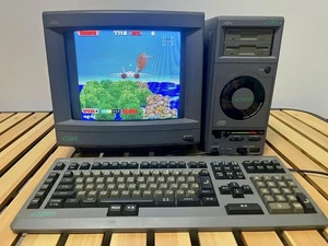 Fujitsu FM TOWNS II Computer Main Unit with Keyboard 6 Software Discs No Monitor - Picture 1 of 24
