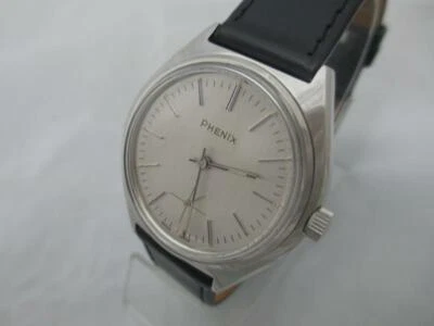 NOS NEW SWISS WATER RESISTANT MECHANICAL HAND WINDING MEN'S PHENIX WATCH 1960'S  - Image 1 of 3