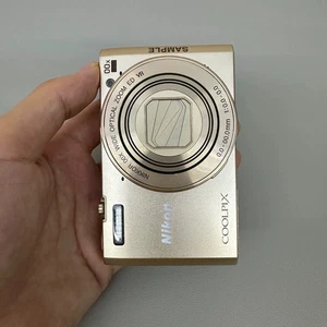 Nikon COOLPIX S7000 16.0MP 20x Optical Zoom Digital Camera w/ Wi-Fi English Gold - Picture 1 of 5