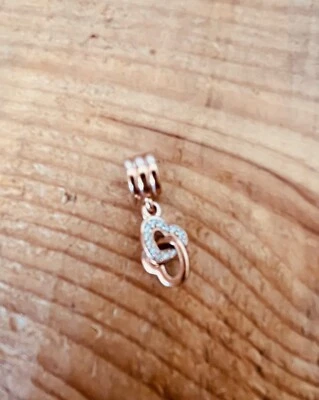 CHARM PENDENTE CUORI INTRECCIATI ROSA - PANDORA - Immagine 1 di 2