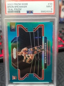 2022 Panini Prizm WWE BRON BREAKKER Teal Prizm #'d 28/49 #39 PSA 9 Rookie - Foto 1 di 7