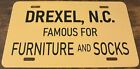 Drexel North Carolina Booster License Plate Famous For Furniture and Socks