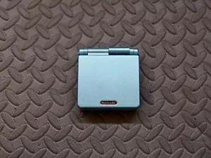 Carcasa de repuesto GBA SP azul perla + lente de pantalla - color tapa de la batería - Imagen 1 de 3