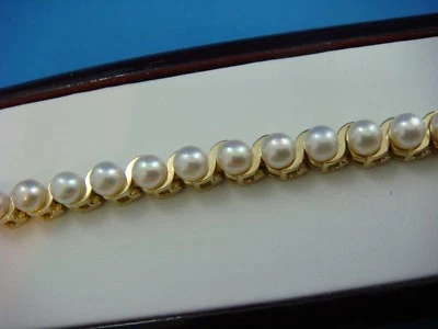 14K YELLOW GOLD HEAVY 24.8 GRAMS PEARL TENNIS BRACELET 7 INCHES LONG  - Image 1 of 4