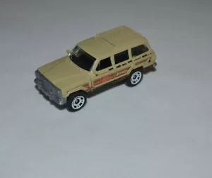 MATCHBOX OFF ROAD RALLY - EXCLUSIVE 1988 JEEP WAGONEER BEIGE LOOSE - Picture 1 of 6