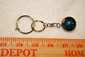 Colored Hearts on World Shaped Keychain Fob - Picture 1 of 4