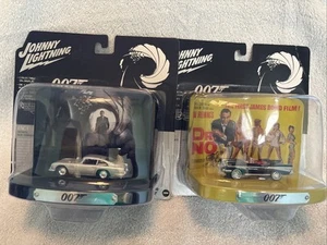 2 New Johnny Lightening James Bond Cars 64 Aston Martin & 57 Chevy Bel Air 1/64 - Picture 1 of 9