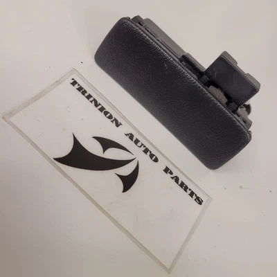 Nissan Xterra 2000-2006 pestillo de guantera negro con tornillos OEM Foto 1 de 4