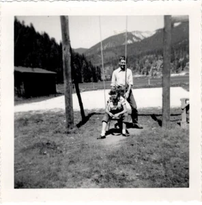 Found Photo Woman in Swing Mountains Vacation Leisure B&W Vernacular 1950s - Picture 1 of 1