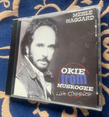 CD MERLE HAGGARD - OKIE DE MUSKOGEE CLÁSICOS EN VIVO Foto 1 de 3