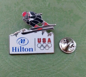 Torino 2006 Sponsor Hilton Hotels Skiing Olympic Pin - Picture 1 of 5