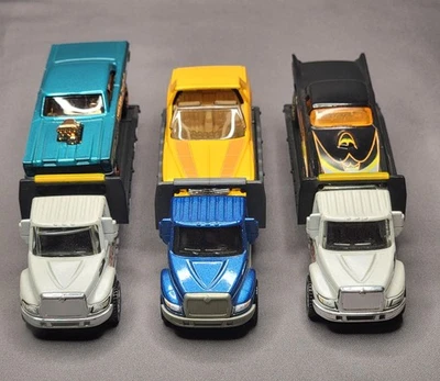 Camión de remolque Matchbox International Durastar 4400 plataforma Lowrider '79 Monte Carlo Foto 1 de 4