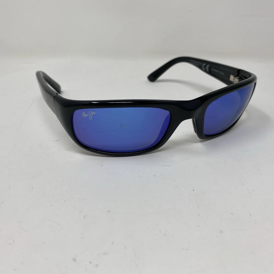 MAUI JIM STINGRAY MJ-103-02 PRETO BRILHANTE COM LENTE POLARIZADA ESPELHO AZUL HV03 - Imagem 1 de 4
