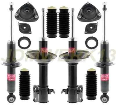 KYB 4 STRUTS SHOCKS DUST BOOTS & WESTAR STRUT MOUNTS KIT for SUBARU BAJA 05 - 06 - Image 1 of 4