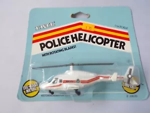 ELICOTTERO VINTAGE ERTL POLICE 1081 METALLO PRESSOFUSO SCALA 1/64 SU CARTA RARO - Foto 1 di 2