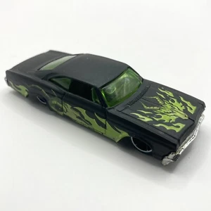 1996 Hot Wheels ‘65 Impala Black w/ Green Flames Mattel Inc - Picture 1 of 10