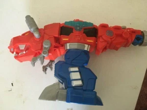 Transformers Rescue Bots Optimus Prime T-Rex - Bild 1 von 2