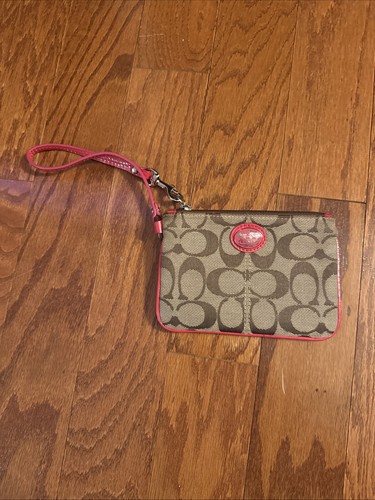Pochette da polso Coach Signature con bordo rosa rosso