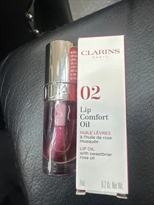 Clarins Lip Comfort Oil 02-Raspberry 0.2 oz - Picture 1 of 2