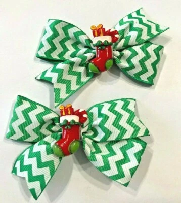 Hermoso conjunto de lazos de pelo de coleta inspirados en medias de Navidad para niñas. Foto 1 de 2