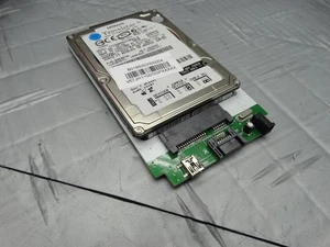 Hitachi Travelstar 60GB Internal 4200RPM 2.5" (IC25N060ATMR040) + SATA Tray - Picture 1 of 8