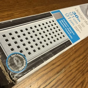 Oatey Designline 36 pulgadas Rejilla de drenaje de ducha lineal de acero inoxidable con patrón cuadrado - Imagen 1 de 4