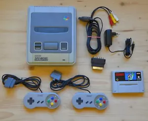 SNES - Super Nintendo Konsole mit 2 Controller + Super Mario World - Bild 1 von 1